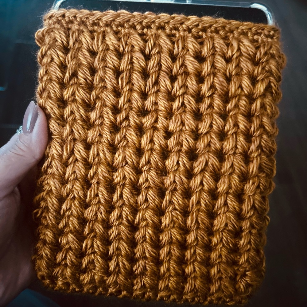 Hand-crochet rust colored Kindle Paperwhite Tablet Sleeve.